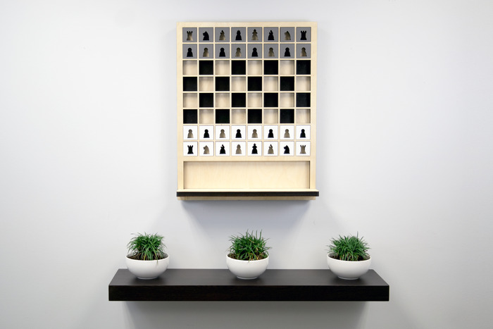 wall-hanging chessboard Mate