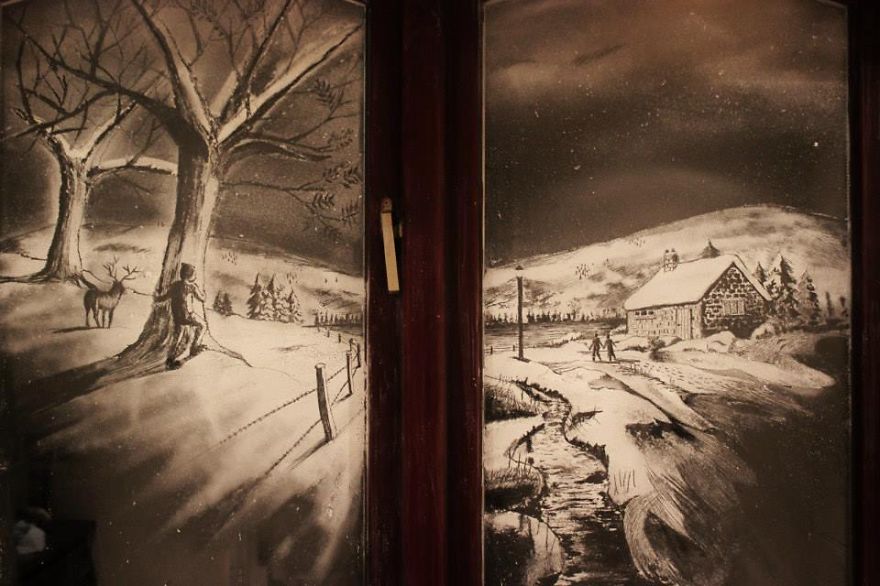 Artist Uses Snow Spray To Create Incredible Winter Scenes On Window Panes
