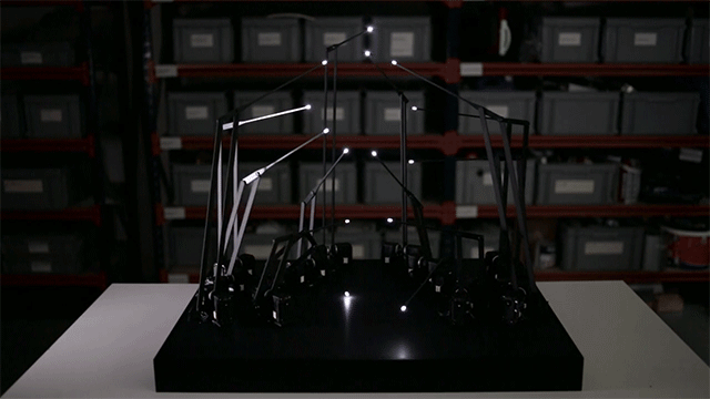 A Kinetic Sculpture Mimics a Walking Person