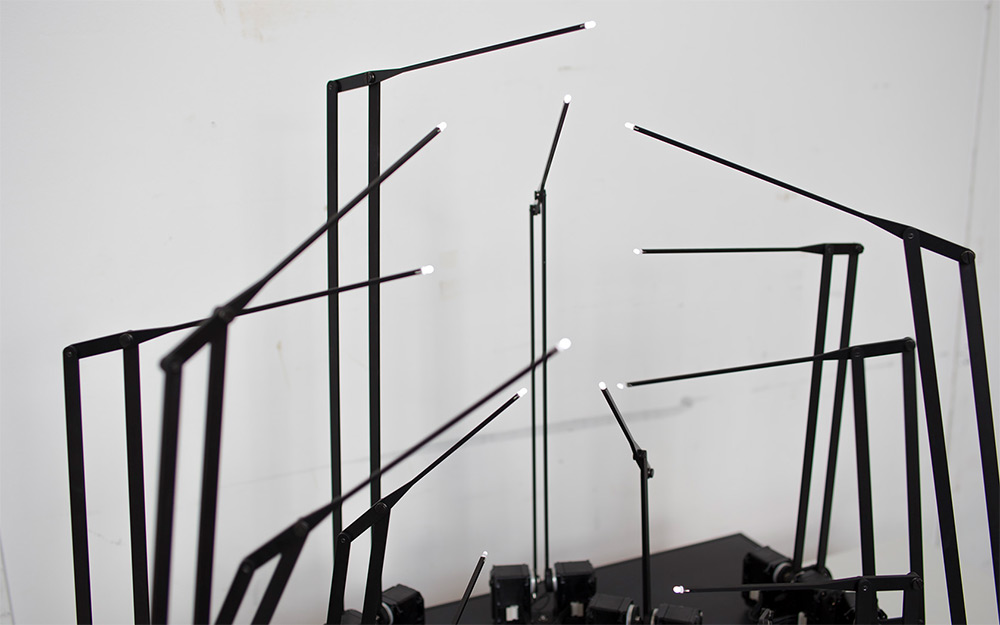 A Kinetic Sculpture Mimics a Walking Person