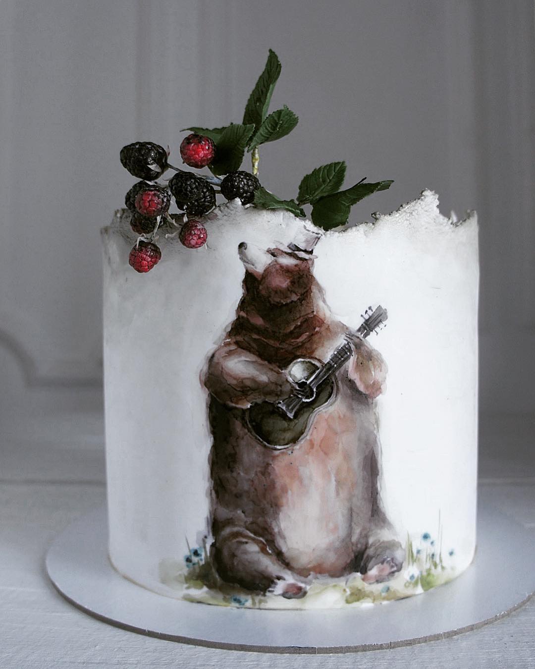 cake with a bear playing guitar