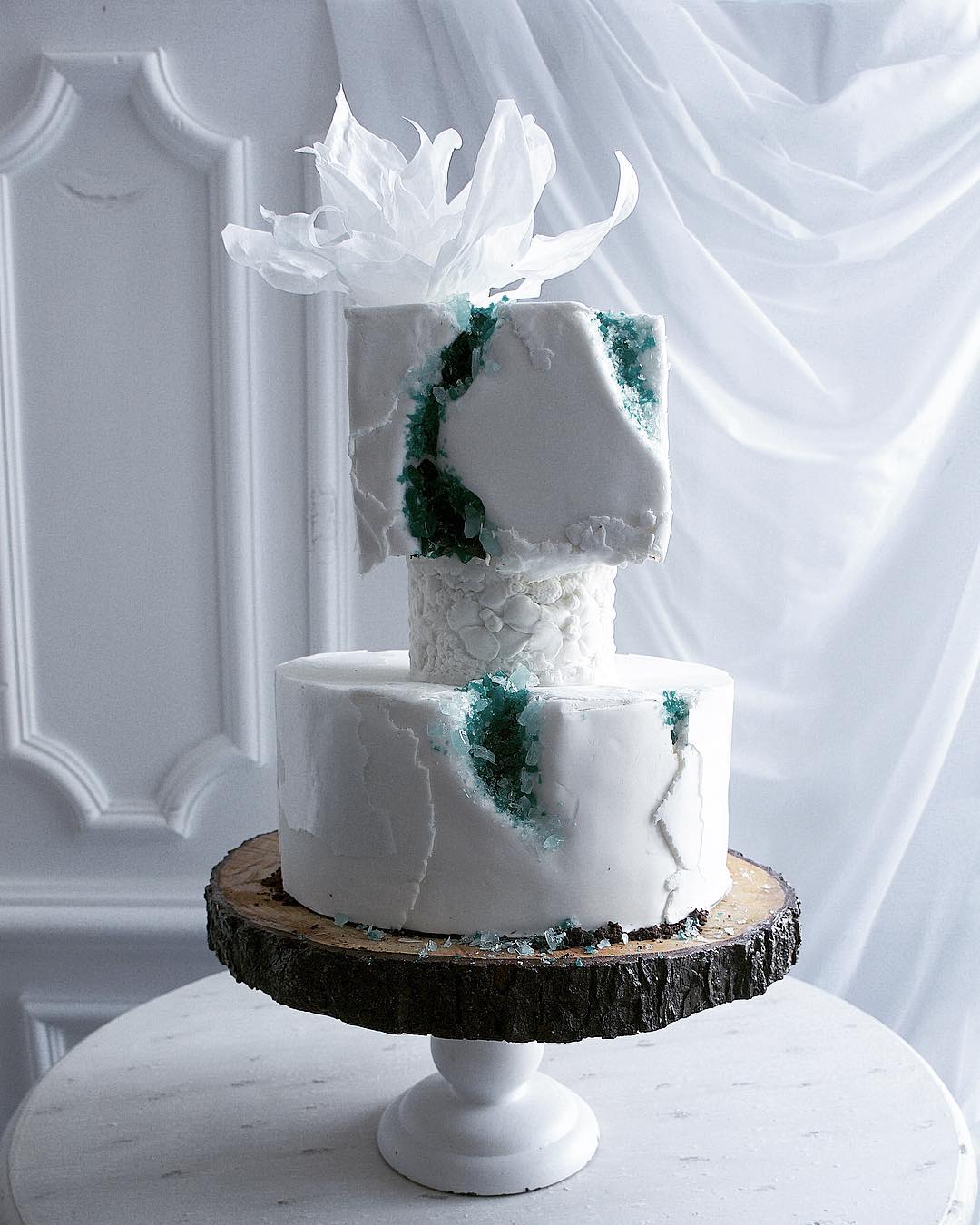 white creative wedding cake