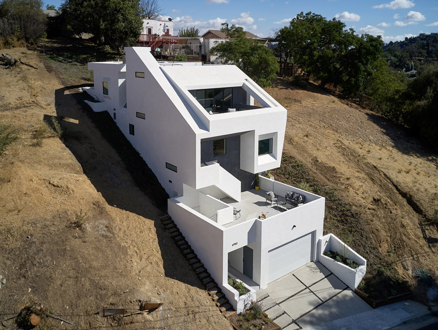 Little White House On a Hillside by Urban Operations