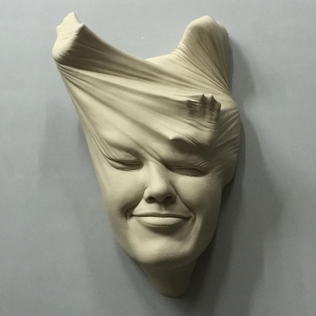 ceramic face sculpture