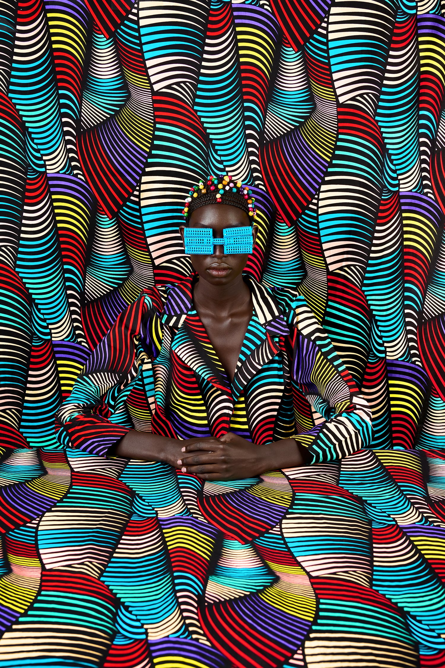 Vibrant Textiles and Repurposed Eyewear Camouflage on Thandiwe Muriu's Portraits