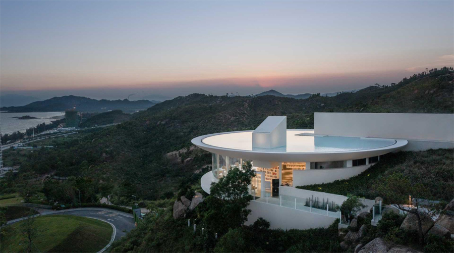 Clifftop Library in China with Circular Pool