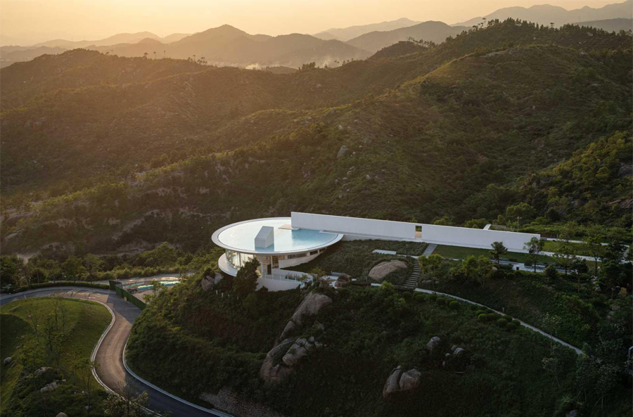 Clifftop Library in China with Circular Pool