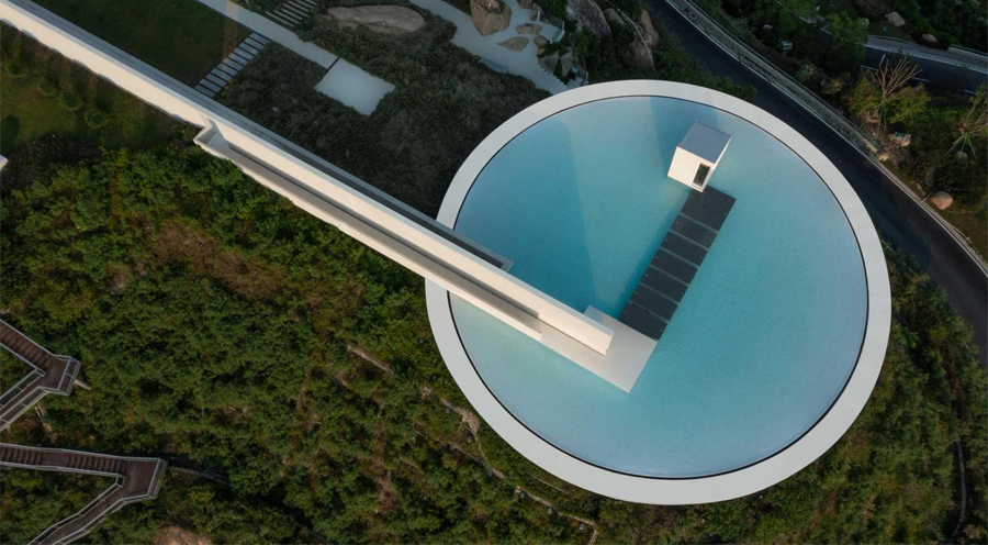 Clifftop Library in China with Circular Pool