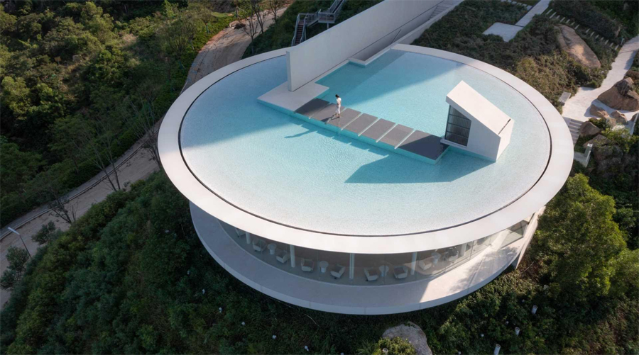 Clifftop Library in China with Circular Pool