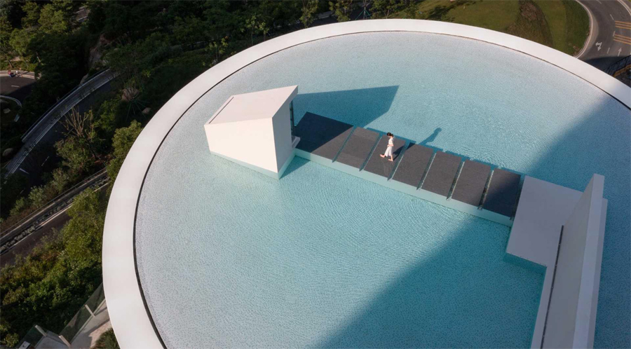 Clifftop Library in China with Circular Pool