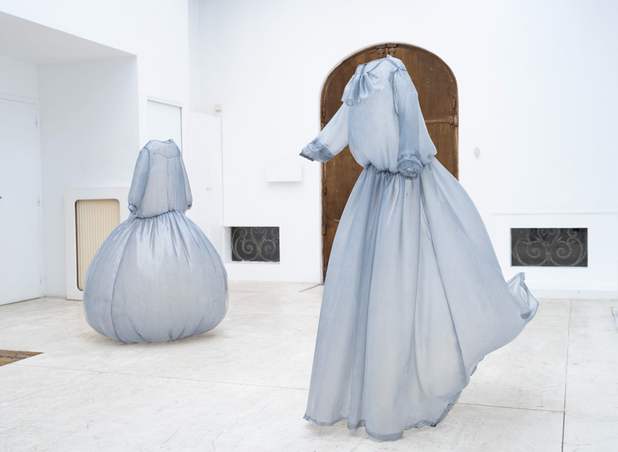 Sculpted Dresses Breathing in Empty Space Sculpted Dresses Breathing in Empty Space
