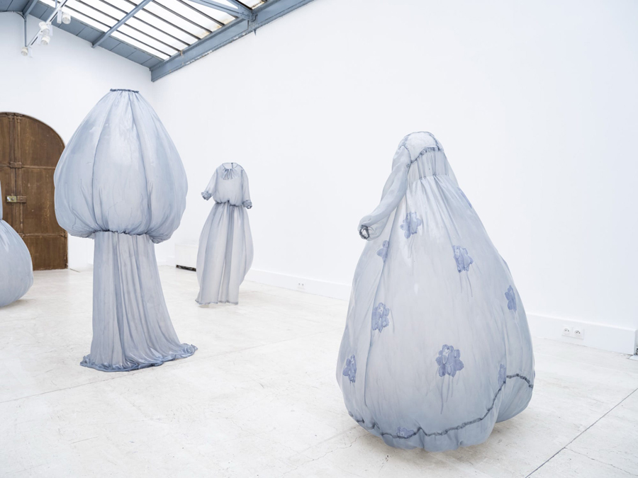 Sculpted Dresses Breathing in Empty Space Sculpted Dresses Breathing in Empty Space