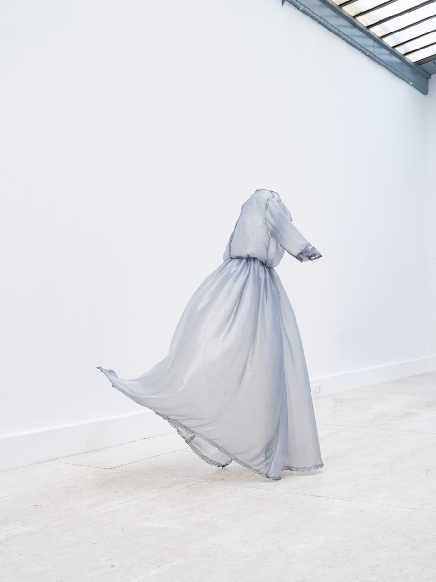 Sculpted Dresses Breathing in Empty Space Sculpted Dresses Breathing in Empty Space