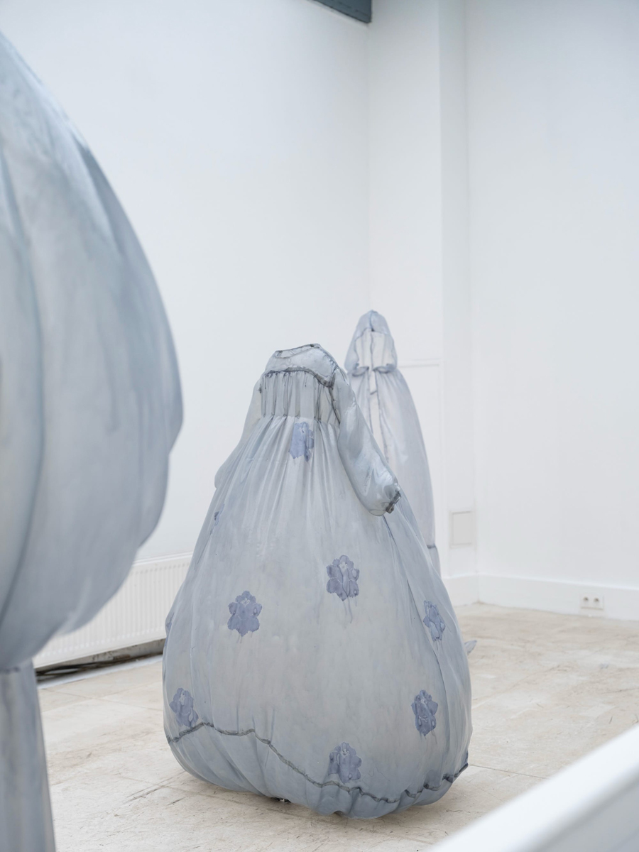 Sculpted Dresses Breathing in Empty Space Sculpted Dresses Breathing in Empty Space