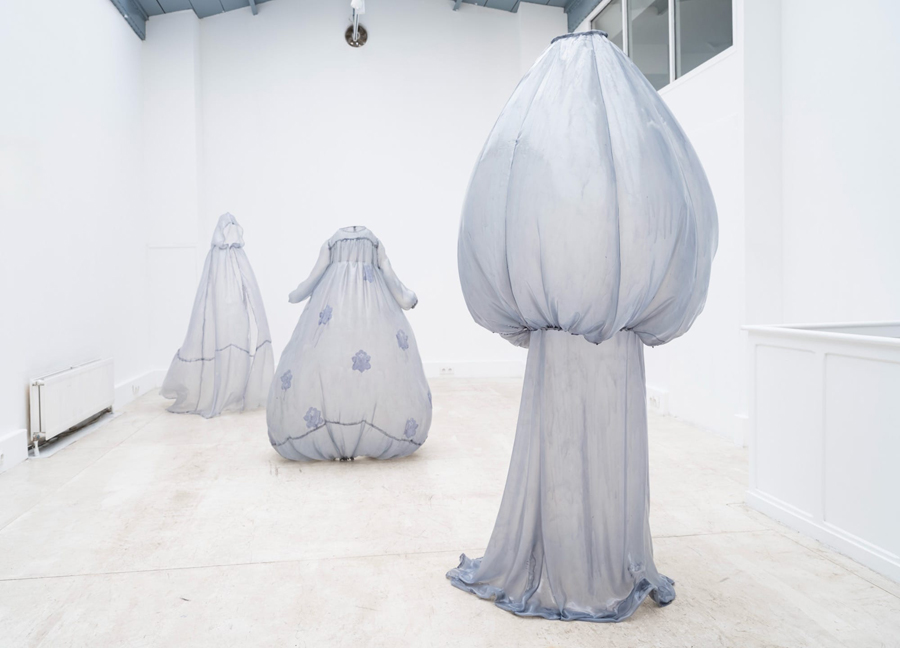 Sculpted Dresses Breathing in Empty Space Sculpted Dresses Breathing in Empty Space